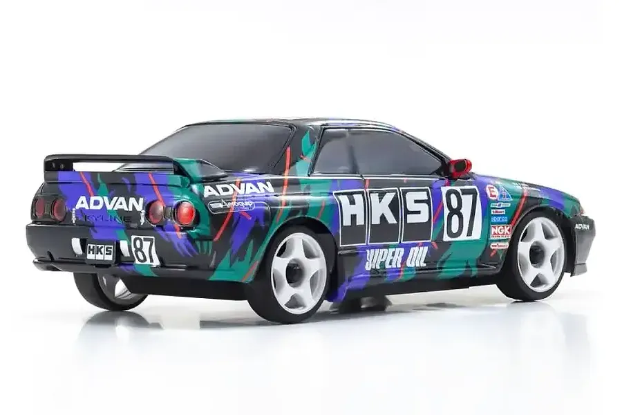 Kyosho Mini-Z HKS Skyline R32 GT-R #87 pre-painted RC body shell, rear three-quarter view on a white background.