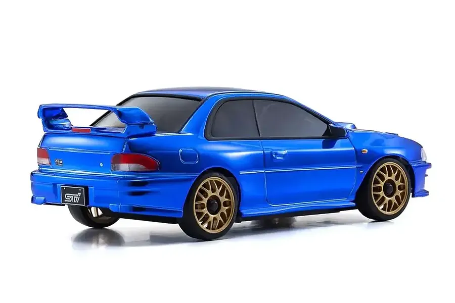 A rear three-quarter view of a Kyosho Mini-Z Subaru Impreza 22B-STi body shell in chrome blue with gold wheels against a white background.