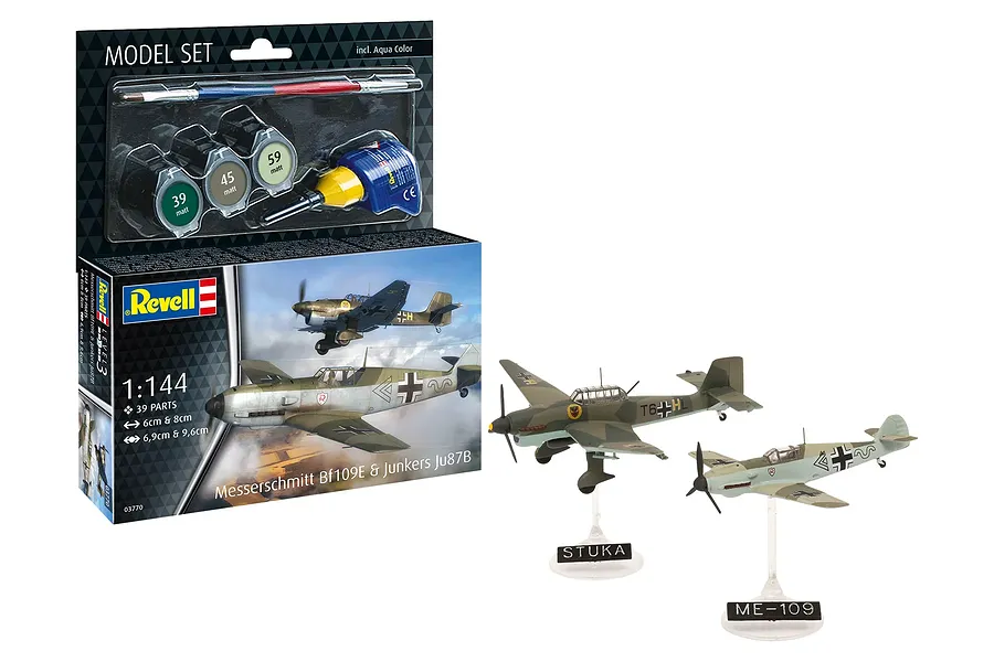Revell 1/144 scale Messerschmitt Bf109E and Junkers Ju87B model aircraft twin pack kit with box, paints, glue, brush, and two assembled display models.