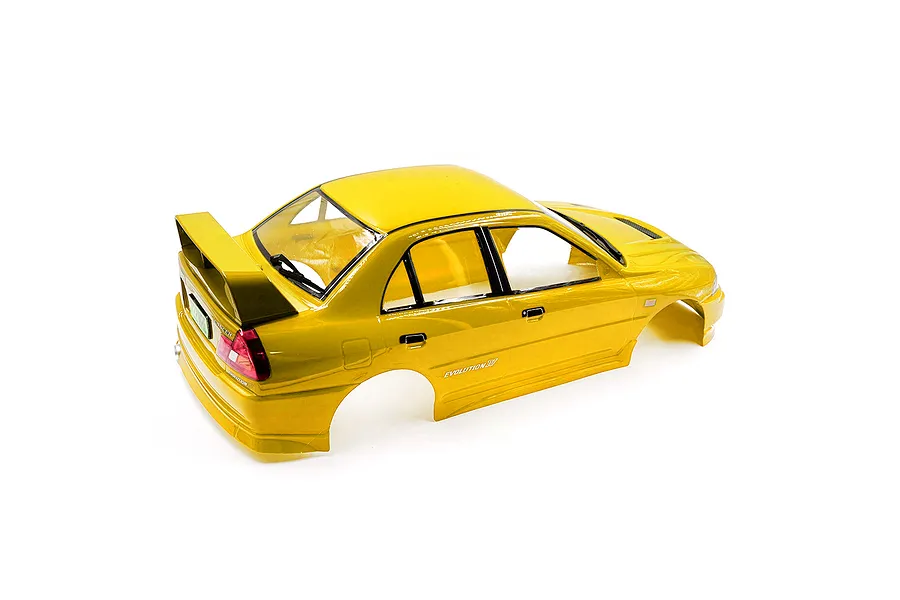 A yellow painted 1/10 scale RC Mitsubishi Lancer Evolution IV body shell viewed from the rear three-quarter angle against a white background.