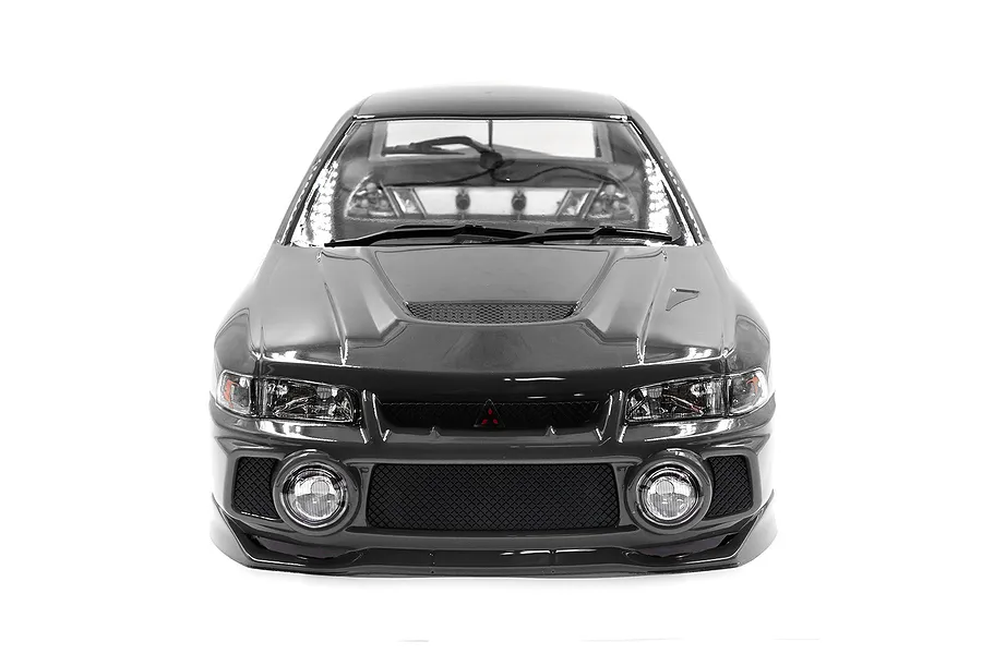Front view of a silver 1/10 scale Mitsubishi Lancer Evo IV RC car body shell with detailed headlights and grille.
