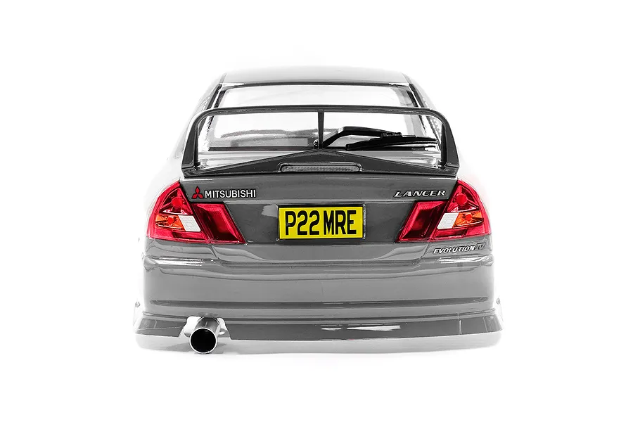 Rear view of a silver 1/10 scale Mitsubishi Lancer Evolution IV RC car body shell featuring a rear spoiler, exhaust pipe, and yellow license plate.