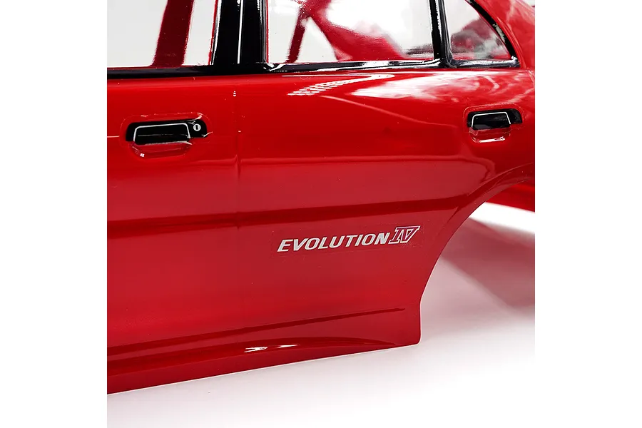 Close-up of a red painted RC Mitsubishi Lancer Evolution IV body shell showing the side door, handle, and Evolution IV decal.