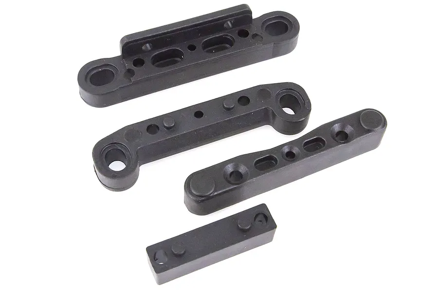 A set of four black plastic HSP suspension arm pin mounts for RC cars, shown on a white background.