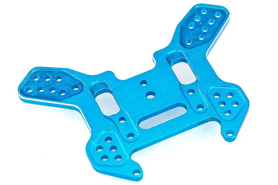 A blue anodized aluminium rear shock tower for an RC car, featuring multiple mounting holes and a flat, machined design.