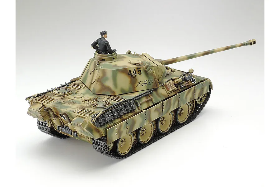A 1/48 scale Tamiya German Panther Ausf.D model tank, painted in a camouflage pattern with a tank commander figure in the turret hatch.