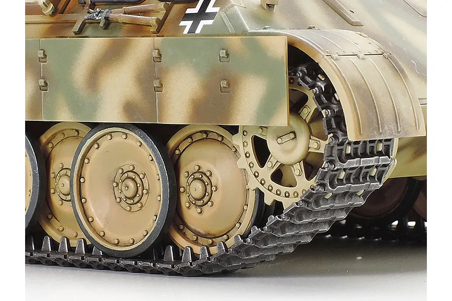 Close-up of the side hull, road wheels, and tracks of a painted 1/48 scale German Panther Ausf.D tank model kit.