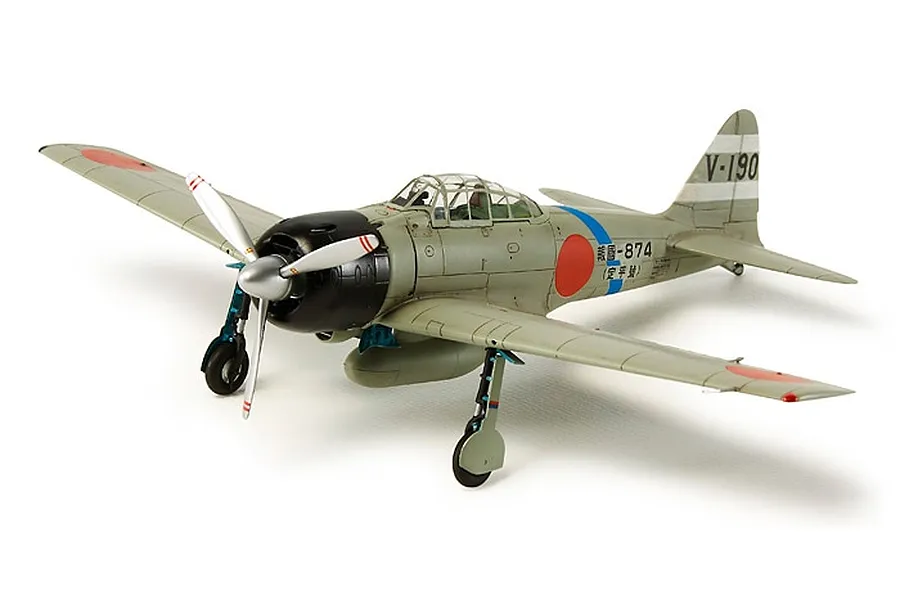 A fully assembled and painted 1/72 scale model of a Mitsubishi A6M3 Zero fighter plane, showing the grey fuselage, red roundels, and V-190 tail markings.