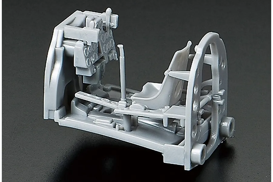 Unpainted grey plastic model aircraft cockpit assembly for a Tamiya 1/72 scale Mitsubishi A6M3 Zero fighter kit.