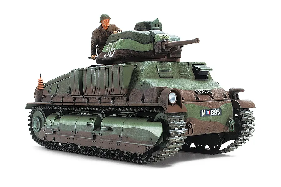 A fully assembled and painted 1/35 scale Tamiya Somua S35 French medium tank model with a crew figure in the turret, featuring a green and brown camouflage.