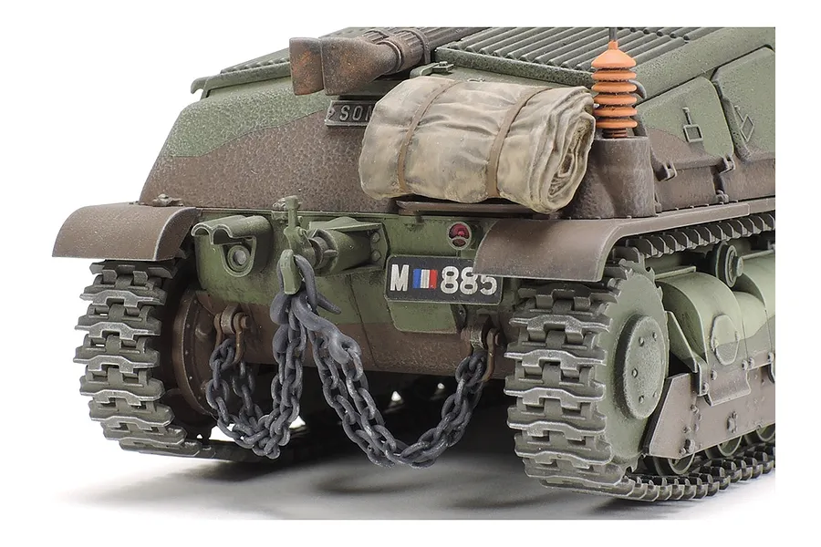 Close-up rear view of a painted Tamiya 1/35 scale French Somua S35 tank model showing detailed tracks, a tow chain, and a rolled tarp.
