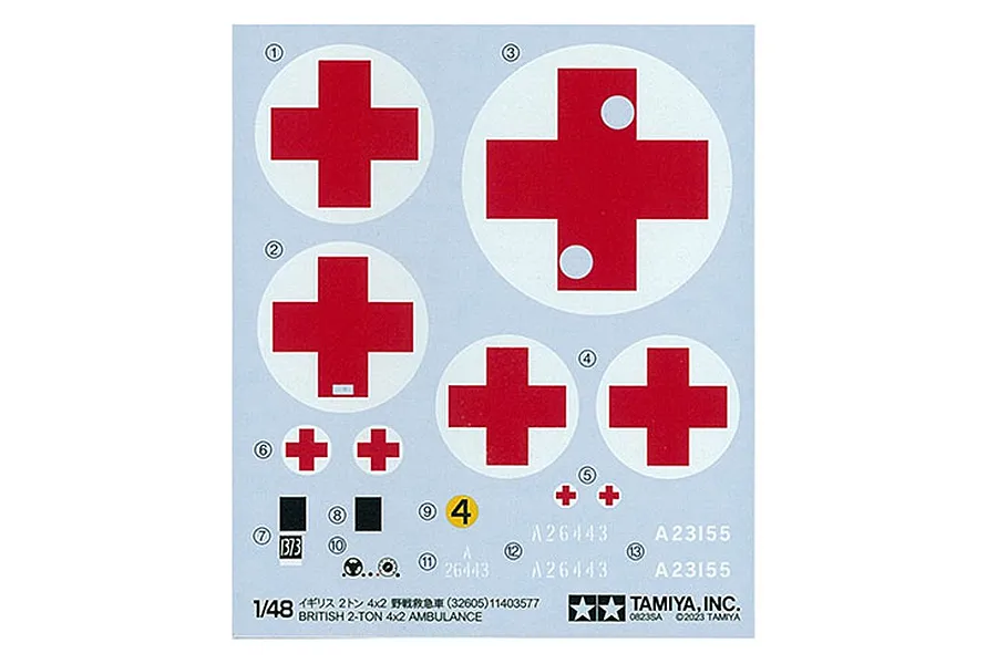 A Tamiya 1/48 scale decal sheet for the British 2-Ton Austin K2 Ambulance model kit, featuring various red cross symbols and identification numbers.