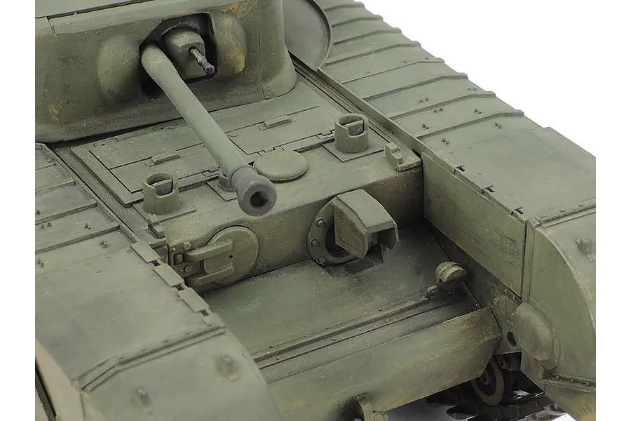 Close-up of a painted 1/35 scale Tamiya Churchill Crocodile tank model showing the front hull, turret, and main gun barrel.