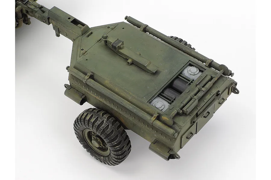 A high-angle view of the Tamiya 1/35 scale Churchill Crocodile fuel trailer model, painted in olive drab with weathered details.