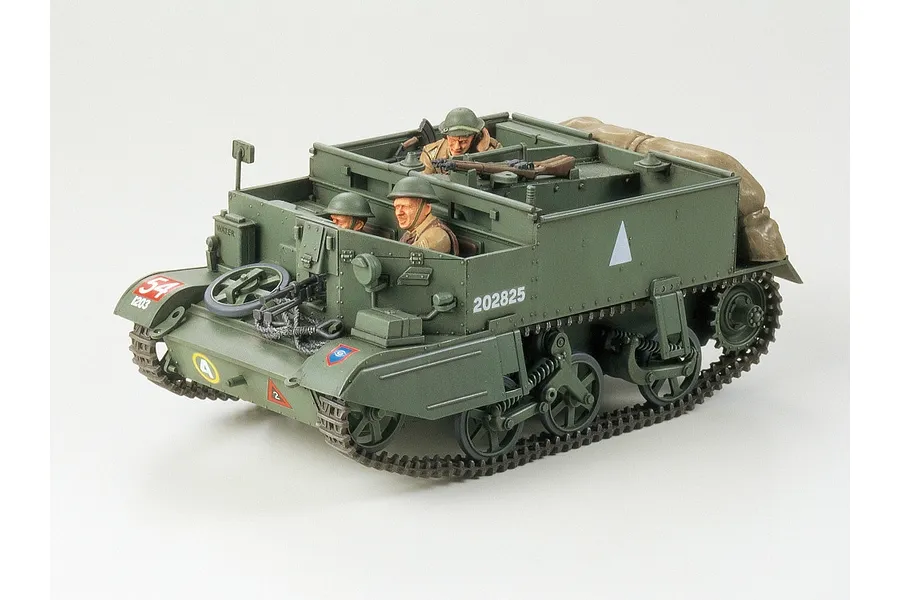 A fully assembled and painted Tamiya 1/35 scale British Mk.II Universal Carrier model kit with three crew figures.