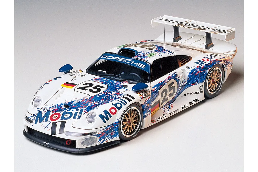 A fully assembled and painted 1/24 scale Tamiya Porsche 911 GT1 model car featuring the Mobil 1 racing livery with number 25.