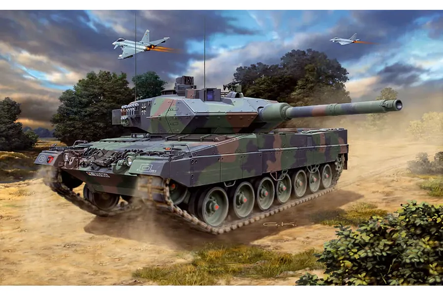 Box art illustration of a German Leopard 2A6 tank in camouflage moving through a dusty field with two fighter jets flying in the cloudy sky above.