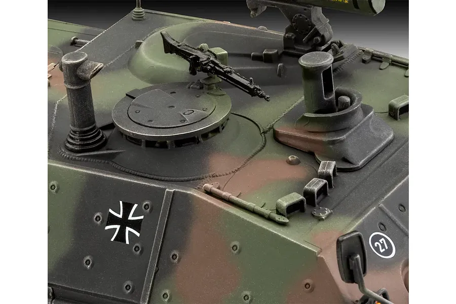 Close-up of a painted 1/35 scale model Raketenjagdpanzer Jaguar 1 tank showing the turret, machine gun, and German military markings.