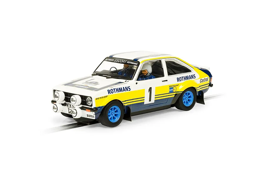 Scalextric 1/32 scale 1979 Ford Escort MkII rally slot car in white, blue, and yellow Rothmans livery, featuring number 1 on the side.
