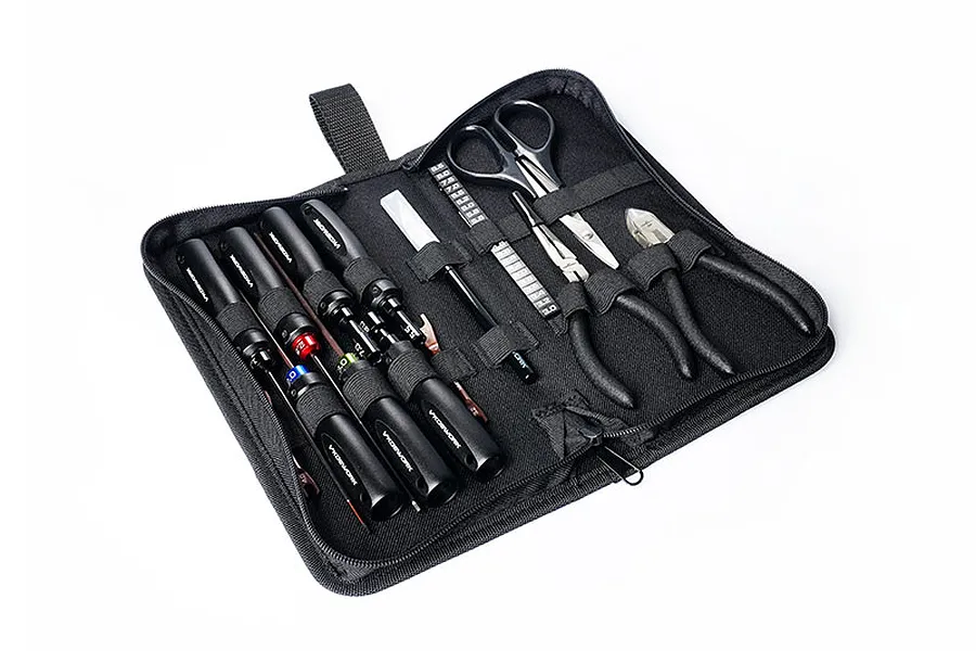 A black Koswork foldable tool bag open and filled with various RC hobby tools including screwdrivers, pliers, and scissors.