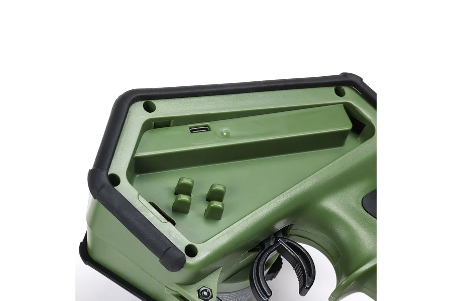 Close-up of the green and black Spektrum DX Rugged transmitter showing the side port area with a USB-C charging port and rubberized buttons.