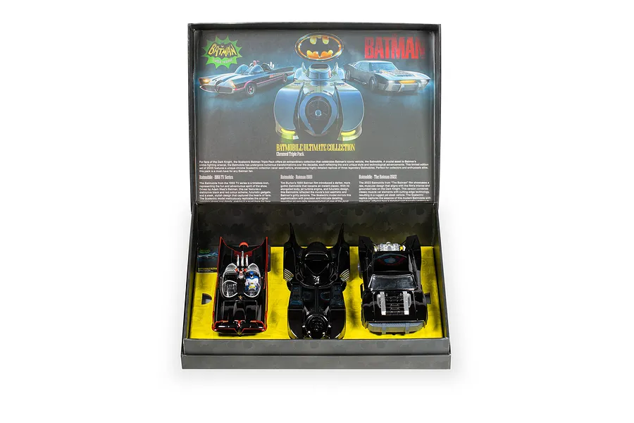 Scalextric Batmobile Ultimate Collection set featuring three 1/32 scale slot cars from 1966, 1989, and 2022 inside a display box.