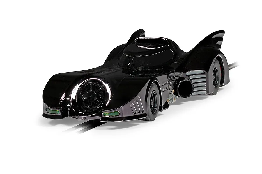 A glossy black 1/32 scale Scalextric Batmobile slot car on a white background.