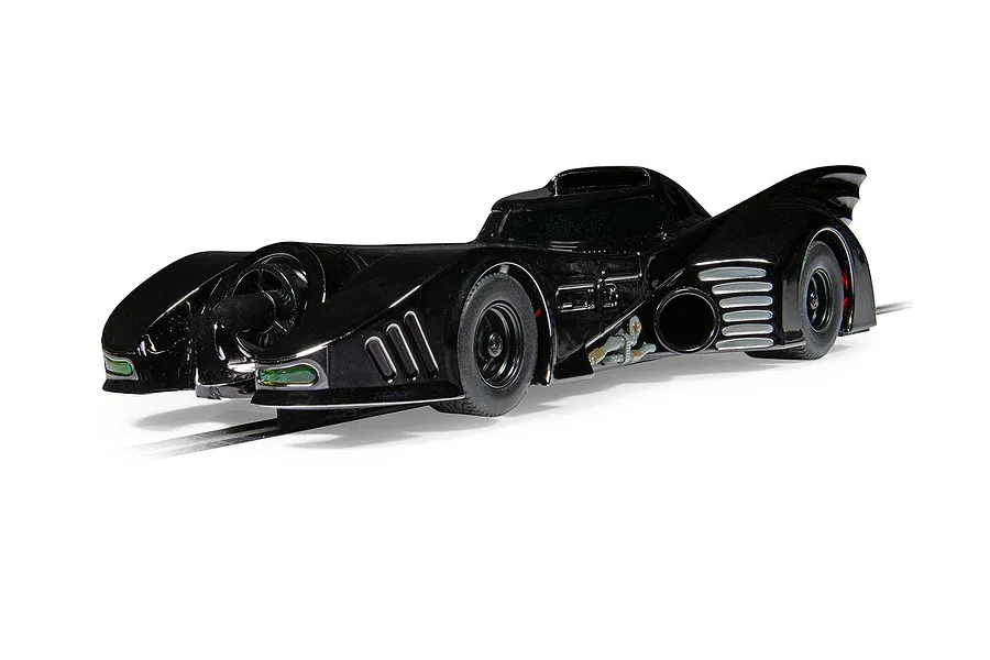 A 1/32 scale black Batmobile slot car from the Scalextric Ultimate Collection, shown on a white background.
