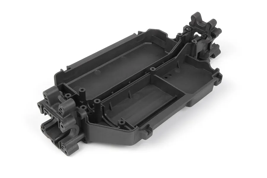 A black plastic main chassis tub for an RC vehicle, shown from a high-angle perspective against a white background.