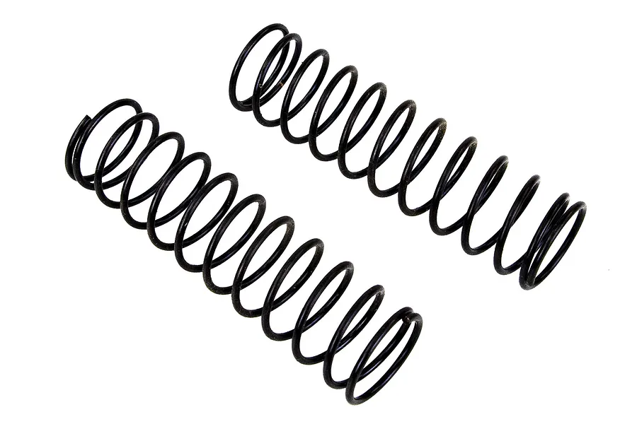 Two black metal coil springs for RC car shock absorbers, shown side by side against a white background.