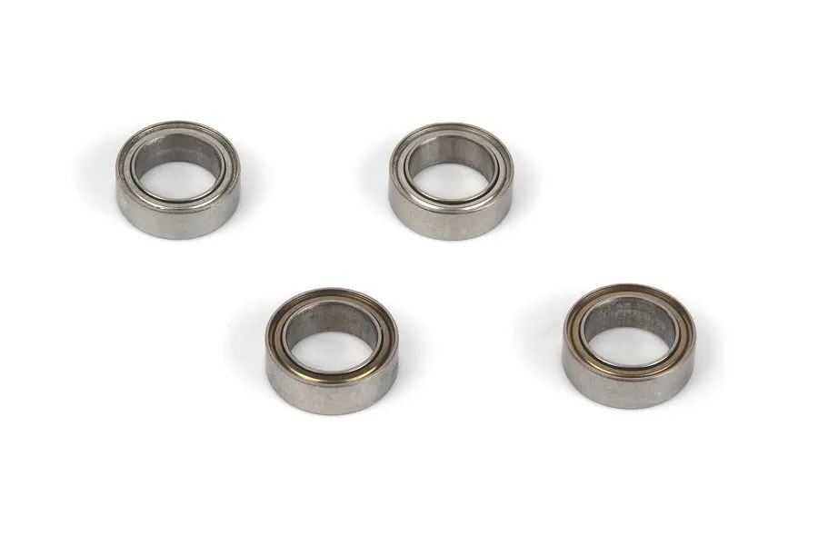 Four small metal shielded ball bearings arranged on a plain white background.