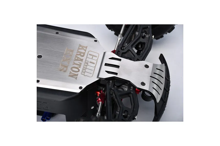 A stainless steel integrated chassis skid plate installed on an ARRMA Kraton EXB RC vehicle, showing the metal plate with branding.