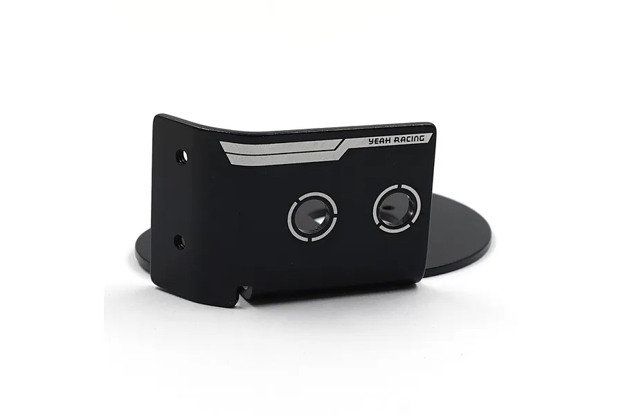 A black aluminium motor mount plate by Yeah Racing with white branding and circular cutouts on a white background.