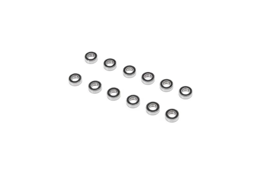A set of twelve small metal ball bearings with black rubber seals arranged in two rows on a white background.