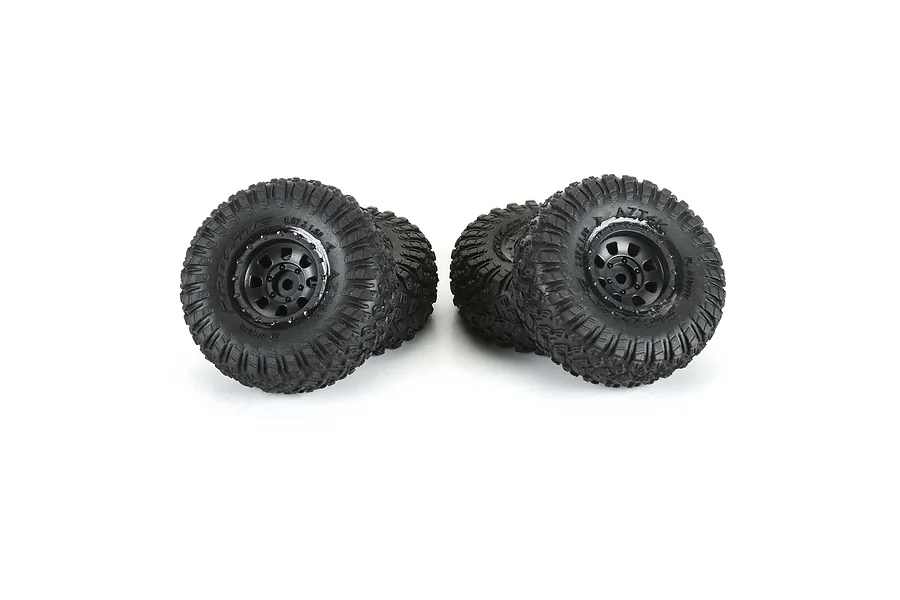 Four Pro-Line Aztek wheels with black Clobber tyres, pre-glued and ready for RC vehicles.