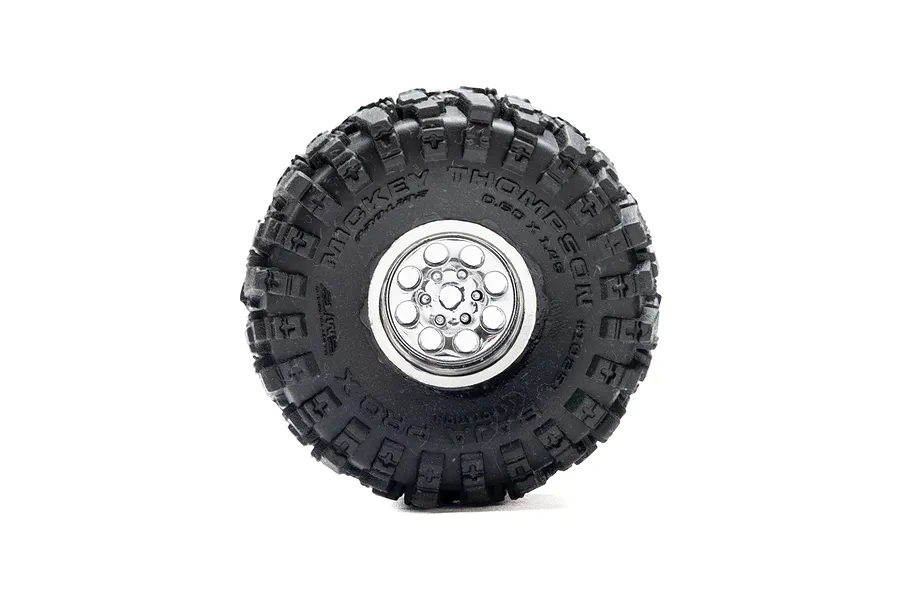 A single Pro-Line 1/30 scale chrome wheel with a black Mickey Thompson Baja Pro X tyre, isolated on a white background.