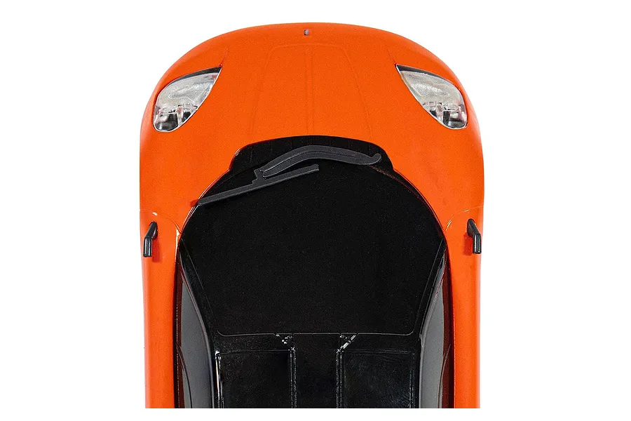 Top-down view of the front section of an orange Scalextric GMA T.50 slot car, showing the hood, windshield, and headlights.