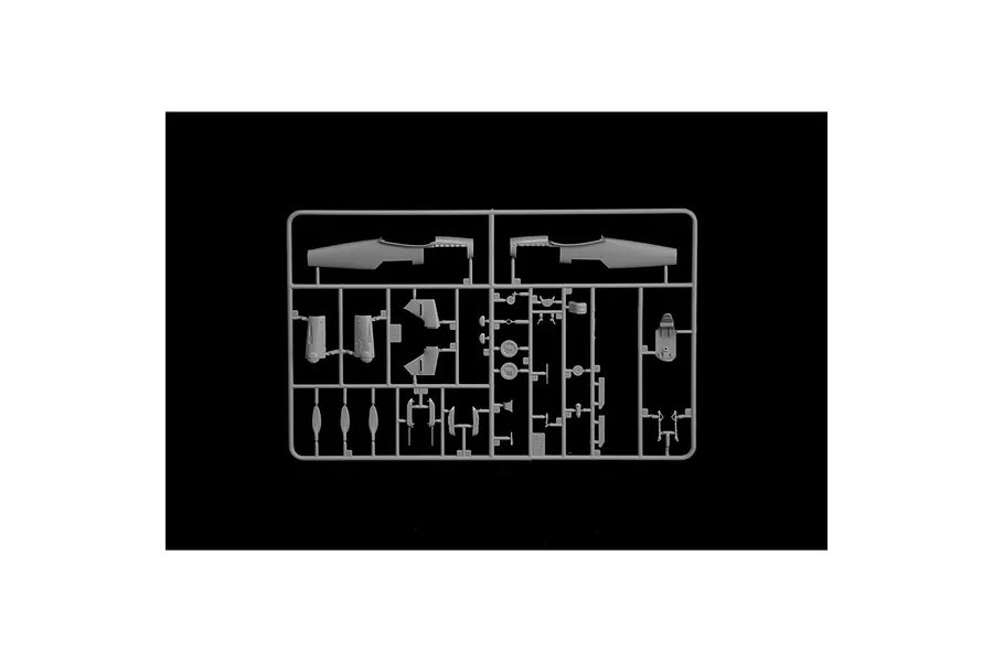 A grey plastic model kit sprue containing various aircraft parts for an Italeri Bf 109 G-6 model, including fuselage halves and cockpit components.
