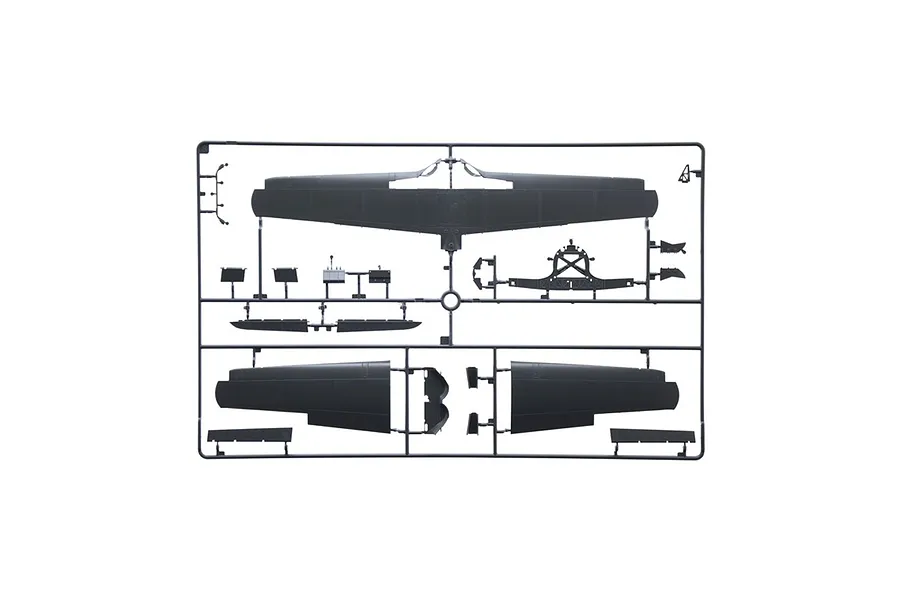 A grey plastic sprue containing various model aircraft parts, including wings and internal structural components for a 1/32 scale model kit.