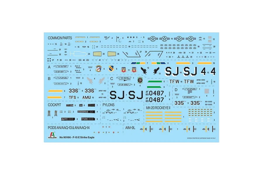 A decal sheet for an Italeri 1/72 F-15E Strike Eagle model kit, featuring various markings, insignias, and text on a light blue backing paper.