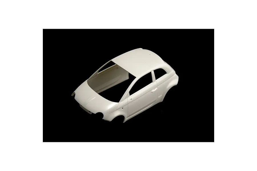 Unpainted white plastic car body shell for a 1/24 scale model kit of a Fiat 500 Abarth.