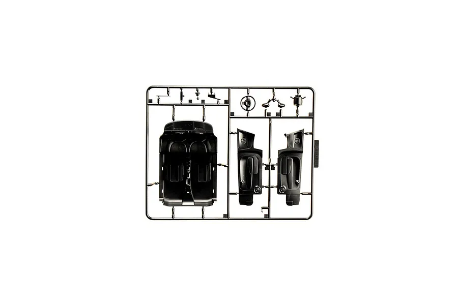 A black plastic model kit sprue containing interior parts for a 1/24 scale Fiat 500 Abarth model car.