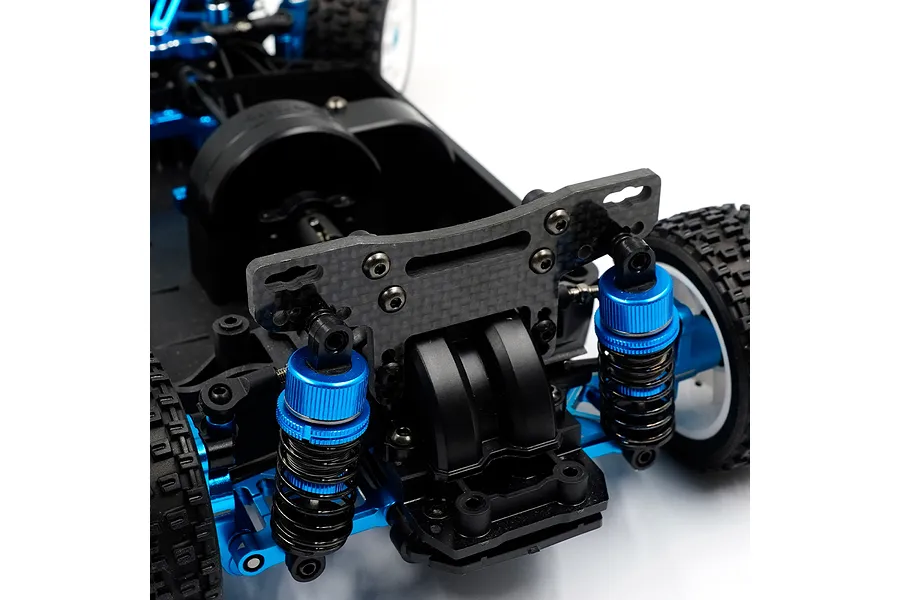 Close-up of a carbon fibre rear shock tower installed on an RC car chassis with blue anodized aluminium shock absorbers.