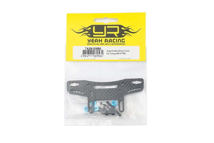Yeah Racing carbon fibre rear shock tower for Tamiya XM-01 PRO in original packaging with mounting hardware.