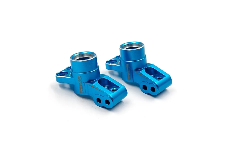 Two blue anodized aluminium rear hubs for RC cars by Yeah Racing, shown from a high-angle perspective against a white background.