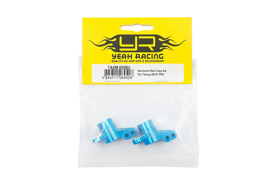 Two blue anodized aluminium rear hubs for Tamiya XM-01 PRO in original Yeah Racing packaging.