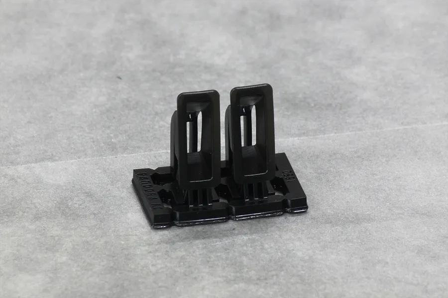 A pair of black plastic 33-Type air ducts by Pandora RC for 1/10 scale RC car bodies, shown on a grey surface.