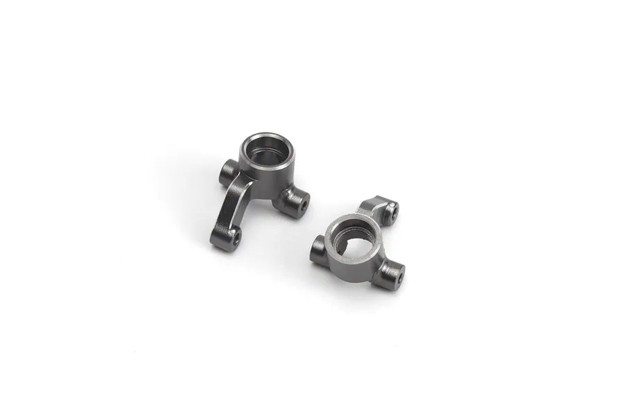 Two grey aluminium steering hubs for an RC car, shown from a top-down angle on a white background.