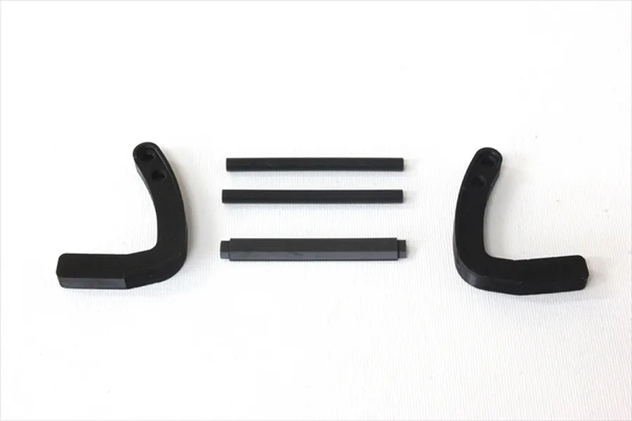 A set of black plastic RC grill guard components including two curved side brackets and three horizontal crossbars on a white background.