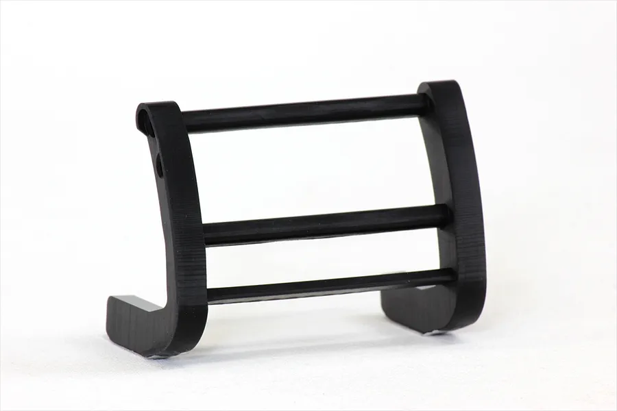 A black 1/10 scale RC grill guard with a three-bar design, shown against a plain white background.
